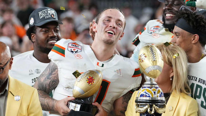 Miami Hurricanes quarterback Carson Beck (11) is named offensive player of the game after their 31-27 win over the Ole Miss Rebels during their Vrbo Fiesta Bowl matchup at State Farm Stadium on Jan. 8, 2026. Miami Hurricanes quarterback Carson Beck (11) is named offensive player of the game after their 31-27 win over the Ole Miss Rebels during their Vrbo Fiesta Bowl matchup at State Farm Stadium on Jan. 8, 2026.