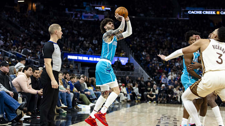 Jan 17, 2026; San Francisco, California, USA; Charlotte Hornets guard LaMelo Ball (1) takes a three-point shot against the Golden State Warriors during the third quarter at Chase Center. Mandatory Credit: John Hefti-Imagn Images