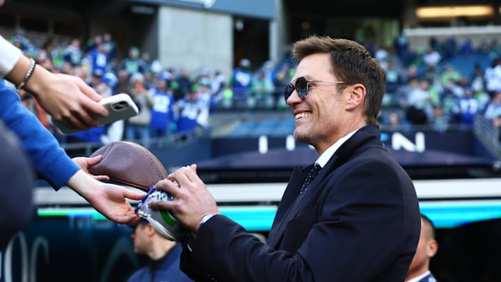 Tom Brady signed autographs before the NFC Championship Game.