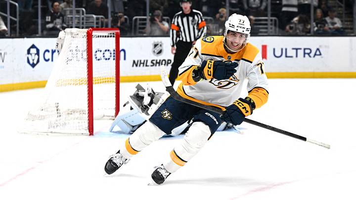 Apr 2, 2026; Los Angeles, California, USA; Nashville Predators right wing Luke Evangelista (77) celebrates after winning the penalty shootout against the Los Angeles Kings at Crypto.com Arena. Mandatory Credit: Griffin Hooper-Imagn Images