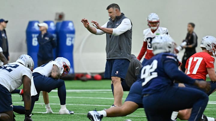 May 9, 2025; Foxborough, MA, USA; New England Patriots head coach Mike Vrabel (c) works with players at rookie camp at Gillette Stadium. Mandatory Credit: Eric Canha-Imagn Images