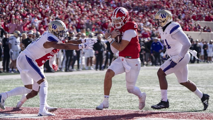 Oct 26, 2024; Bloomington, Indiana, USA; Indiana Hoosiers quarterback Tayven Jackson (2) runs the ball for a touchdown during the fourth quarter against the Washington Huskies at Memorial Stadium. Mandatory Credit: Jacob Musselman-Imagn Images