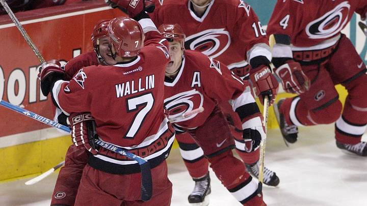 The Hurricanes pour off the bench after Niclas Wallin scores the overtime winner in Game 4 at the Molson Centre in Montreal, Quebec, Canada, on May 9, 2002. The Hurricanes pour off the bench after Niclas Wallin scores the overtime winner in Game 4 at the Molson Centre in Montreal, Quebec, Canada, on May 9, 2002.