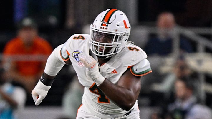 Dec 31, 2025; Arlington, TX, USA; Miami Hurricanes defensive lineman Rueben Bain Jr. (4) rushes the line during the 2025 Cotton Bowl and quarterfinal game of the College Football Playoff at AT&T Stadium. Mandatory Credit: Jerome Miron-Imagn Images
