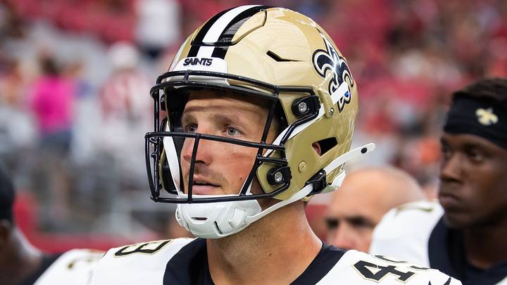 Aug 10, 2024; Glendale, Arizona, USA; New Orleans Saints  long snapper Zach Wood (49) against the Arizona Cardinals during a preseason NFL game at State Farm Stadium. Mandatory Credit: Mark J. Rebilas-USA TODAY Sports