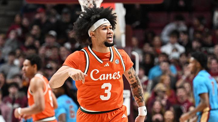 Feb 24, 2026; Tallahassee, Florida, USA; Miami Hurricanes guard Tre Donaldson (3) celebrates a three point shot during the first half against the Florida State Seminoles at Donald L. Tucker Center. Mandatory Credit: Melina Myers-Imagn Images