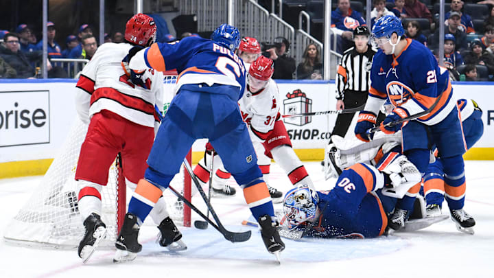 Dec 7, 2024; Elmont, New York, USA; Carolina Hurricanes right wing Andrei Svechnikov (37) scores a gol against the New York Islanders during the second period at UBS Arena. Mandatory Credit: John Jones-Imagn Images