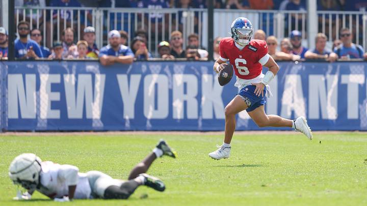 Aug 4, 2025; East Rutherford, NJ, USA; New York Giants quarterback Jaxson Dart (6) scrambles during training camp at Quest Diagnostics Training Center. Aug 4, 2025; East Rutherford, NJ, USA; New York Giants quarterback Jaxson Dart (6) scrambles during training camp at Quest Diagnostics Training Center.