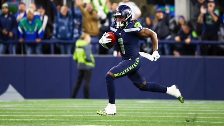 Aug 24, 2024; Seattle, Washington, USA; Seattle Seahawks wide receiver Dee Eskridge (1) returns a punt for a touchdown against the Cleveland Browns during the second quarter at Lumen Field. Aug 24, 2024; Seattle, Washington, USA; Seattle Seahawks wide receiver Dee Eskridge (1) returns a punt for a touchdown against the Cleveland Browns during the second quarter at Lumen Field.