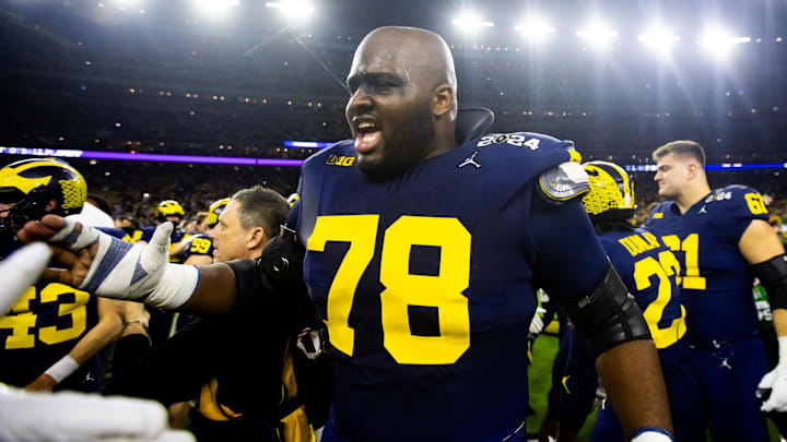 Jan 8, 2024; Houston, TX, USA; Michigan Wolverines offensive lineman Myles Hinton (78) celebrates after defeating the Washington Huskies during the 2024 College Football Playoff national championship game at NRG Stadium. Mandatory Credit: Mark J. Rebilas-Imagn Images