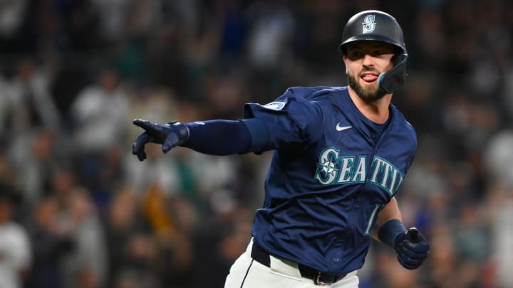 Seattle Mariners pinch hitter Mitch Haniger (17) points to the dugout after hitting a walk-off single against the Chicago White Sox during the tenth inning at T-Mobile Park on June 12. Seattle Mariners pinch hitter Mitch Haniger (17) points to the dugout after hitting a walk-off single against the Chicago White Sox during the tenth inning at T-Mobile Park on June 12.