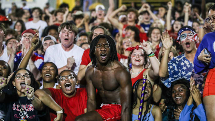 The Louisville Male High student section roars as the Bulldogs rolled past Trinity in 2023 Kentucky high school football. The Louisville Male High student section roars as the Bulldogs rolled past Trinity in 2023 Kentucky high school football.