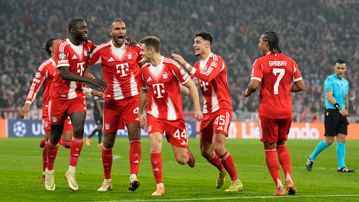 Bayern Munich players celebrating a goal against Sporting CP in the Champions League. Bayern Munich players celebrating a goal against Sporting CP in the Champions League.