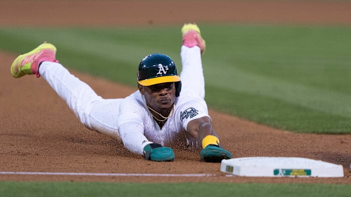 Oakland, California, USA; Oakland Athletics outfielder Esteury Ruiz (1) slides into third base during the fifth inning against the Pittsburgh Pirates at Oakland-Alameda County Coliseum.