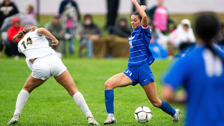 Waukee Northwest's Josie Jones (14) helped the Wolves win the Class 3A Iowa girls soccer state title.