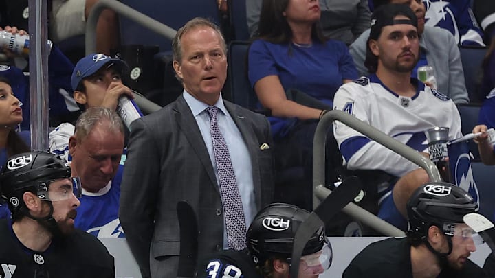 Apr 15, 2025; Tampa, Florida, USA; Tampa Bay Lightning head coach Jon Cooper looks on against the Florida Panthers during the second period at Amalie Arena. Mandatory Credit: Kim Klement Neitzel-Imagn Images