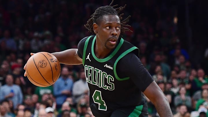 May 14, 2025; Boston, Massachusetts, USA; Boston Celtics guard Jrue Holiday (4) controls the ball in the second half during game five of the second round for the 2025 NBA Playoffs against the New York Knicks at TD Garden. Mandatory Credit: Bob DeChiara-Imagn Images