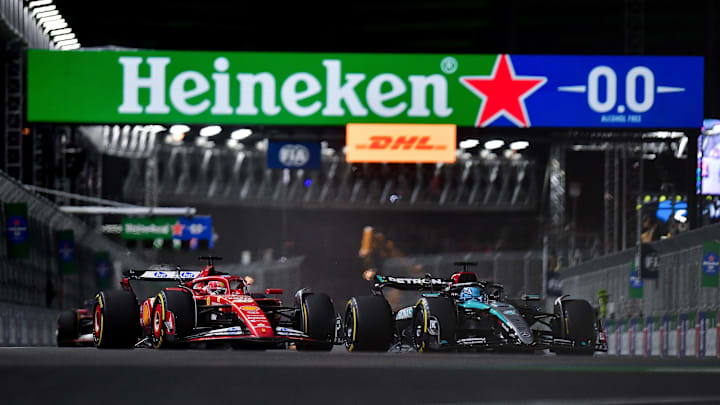 Nov 23, 2024; Las Vegas, Nevada, USA; Mercedes AMG Petronas driver George Russell (63) drives for position against Scuderia Ferrari driver Charles Leclerc (16) during the Las Vegas Grand Prix at Las Vegas Circuit. Mandatory Credit: Gary A. Vasquez-Imagn Images