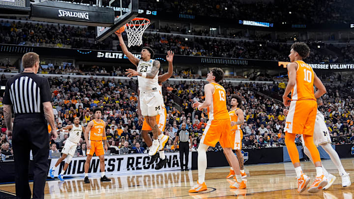 Michigan forward Yaxel Lendeborg (23) makes a lay up against Tennessee during the first half of NCAA Tournament Elite 8 round at United Center in Chicago on Sunday, March 29, 2026.