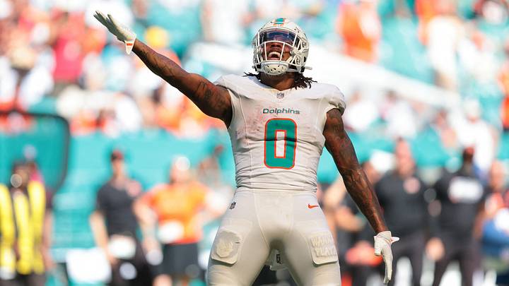 Miami Dolphins running back Ollie Gordon II (0) celebrates after he runs with the ball against the Cincinnati Bengals during the third quarter at Hard Rock Stadium.