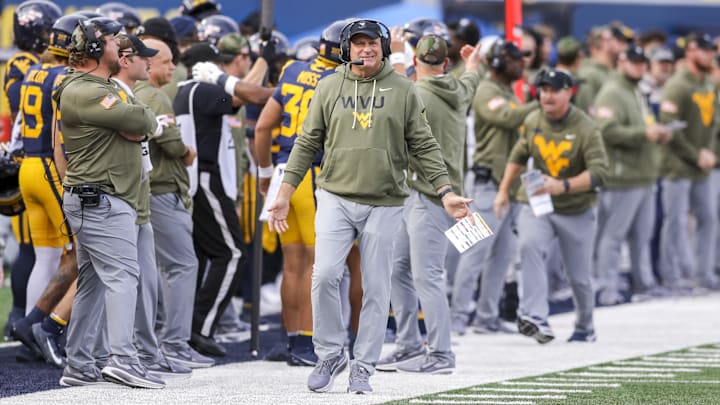 Nov 8, 2025; Morgantown, West Virginia, USA; West Virginia Mountaineers head coach Rich Rodriguez reacts after a play during the third quarter against the Colorado Buffaloes at Milan Puskar Stadium. Mandatory Credit: Ben Queen-Imagn Images Nov 8, 2025; Morgantown, West Virginia, USA; West Virginia Mountaineers head coach Rich Rodriguez reacts after a play during the third quarter against the Colorado Buffaloes at Milan Puskar Stadium. Mandatory Credit: Ben Queen-Imagn Images