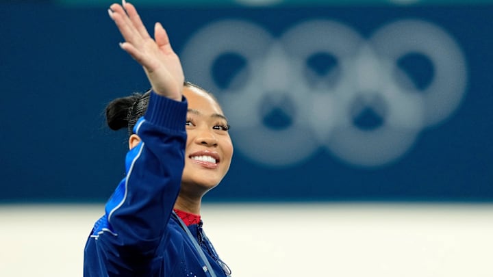 Aug 4, 2024; Paris, France; Sunisa Lee of the United States reacts after winning the bronze medal on uneven bars on the second day of gymnastics event finals during the Paris 2024 Olympic Summer Games at Bercy Arena. Aug 4, 2024; Paris, France; Sunisa Lee of the United States reacts after winning the bronze medal on uneven bars on the second day of gymnastics event finals during the Paris 2024 Olympic Summer Games at Bercy Arena.