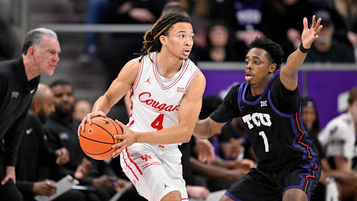 Jan 28, 2026; Fort Worth, Texas, USA; Houston Cougars guard Kingston Flemings (4) looks to pass the ball by TCU Horned Frogs guard Jayden Pierre (1) during the first half at Ed and Rae Schollmaier Arena. Mandatory Credit: Jerome Miron-Imagn Images Jan 28, 2026; Fort Worth, Texas, USA; Houston Cougars guard Kingston Flemings (4) looks to pass the ball by TCU Horned Frogs guard Jayden Pierre (1) during the first half at Ed and Rae Schollmaier Arena. Mandatory Credit: Jerome Miron-Imagn Images