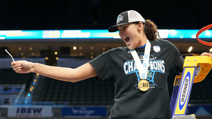 UCLA Bruins center Lauren Betts (51) reacts after cutting the net after her team defeated the USC Trojans during the 2025 TIAA Big Ten Women's Basketball Tournament final game on Sunday, March 9, 2025, at Gainbridge Fieldhouse in Indianapolis. UCLA defeated USC 72-67. UCLA Bruins center Lauren Betts (51) reacts after cutting the net after her team defeated the USC Trojans during the 2025 TIAA Big Ten Women's Basketball Tournament final game on Sunday, March 9, 2025, at Gainbridge Fieldhouse in Indianapolis. UCLA defeated USC 72-67.