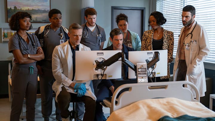 BRILLIANT MINDS -- "The Man from Grozny" Episode 107 -- Pictured: (l-r) Ashleigh LaThrop as Ericka Kinney, Spence Moore II as Jacob Nash, Teddy Sears as Dr. Josh Nicols, Alex MacNicoll as Dr. Van Markus, Brendan Hines as Dr. Simon Gadson, Aury Krebs as Dr. Dana Dang, Tamberla Perry as Dr. Carol Pierce, Zachary Quinto as Dr. Oliver Wolf