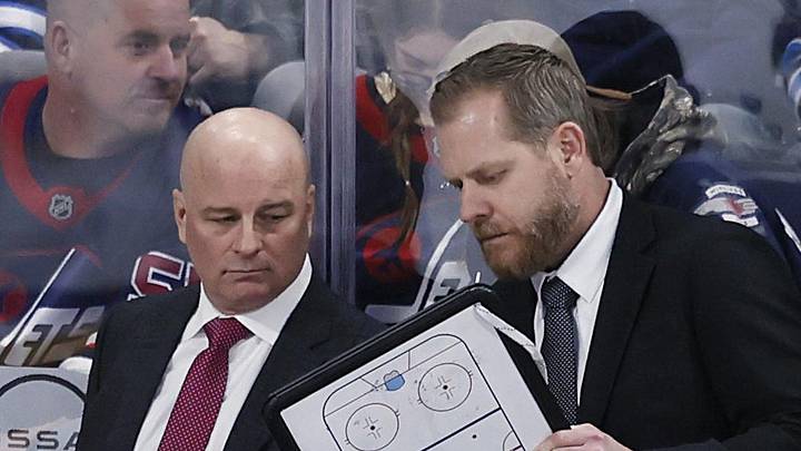 Apr 7, 2025; Winnipeg, Manitoba, CAN; St. Louis Blues head coach Jim Montgomery talks with St. Louis Blues assistant coach Steve Ott during a time out against the Winnipeg Jets in the third period at Canada Life Centre. Mandatory Credit: James Carey Lauder-Imagn Images