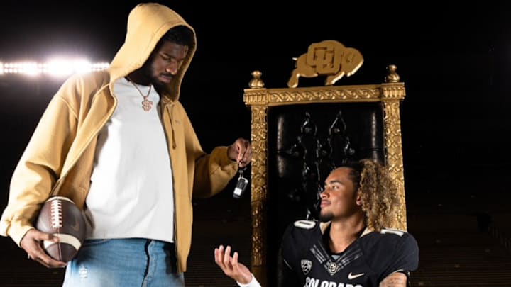 Shedeur Sanders hands the proverbial keys to Carrollton (Georgia) five-star quarterback Julian Lewis during his official visit to Boulder