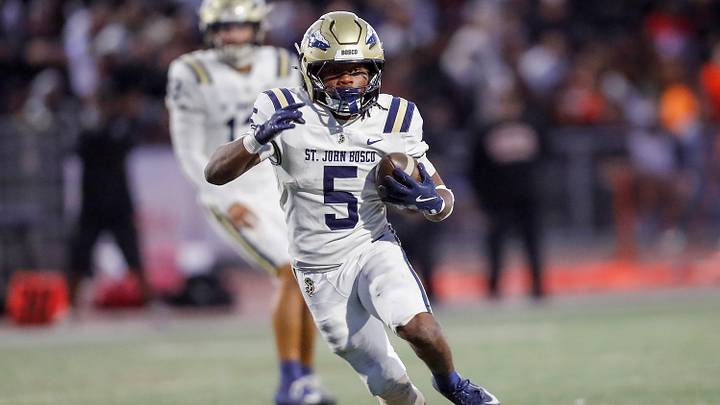 Maliq Allen on his way to a 32-yard touchdown run in the second quarter of St. John Bosco's 26-14 win at Pittsburg on Friday (Sept. 4). Maliq Allen on his way to a 32-yard touchdown run in the second quarter of St. John Bosco's 26-14 win at Pittsburg on Friday (Sept. 4).