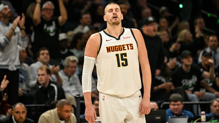 Nikola Jokić reacts after a play against the Minnesota Timberwolves.