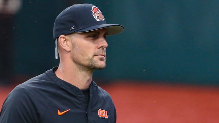 Oregon State head coach Mitch Canham heads to the dugout before an NCAA college baseball game at Goss Stadium on Friday, March 6, 2026, in Corvallis, Ore. Oregon State head coach Mitch Canham heads to the dugout before an NCAA college baseball game at Goss Stadium on Friday, March 6, 2026, in Corvallis, Ore.