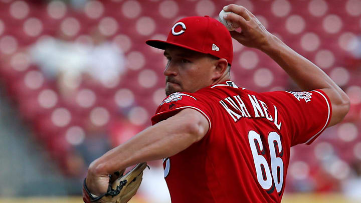 Cincinnati Reds relief pitcher Joel Kuhnel (66) delivers a pitch.