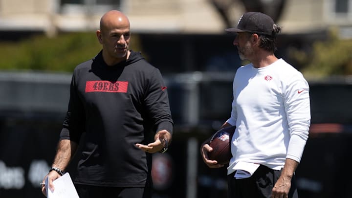 May 9, 2025; Santa Clara, CA, USA; San Francisco 49ers head coach Kyle Shanahan, right, confers with defensive coordinator Robert Saleh during the teamís rookie minicamp. Mandatory Credit: D. Ross Cameron-Imagn Images