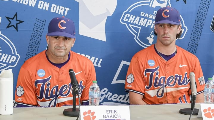 Jun 9, 2024; Clemson, SC, USA; Clemson Head Coach Erik Bakich and Clemson senior Alden Mathes (17) in a press conference after the game against Florida in the NCAA baseball Clemson Super Regional at Doug Kingsmore Stadium