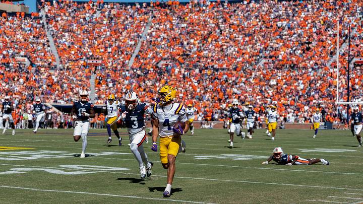LSU Tigers wide receiver Jackson Harris (4) breaks free after a catch for a touchdown as Auburn Tigers take on LSU Tigers at Jordan-Hare Stadium in Auburn, Ala. on Saturday, Oct. 24, 2026. LSU Tigers lead Auburn Tigers 31-10 at halftime. LSU Tigers wide receiver Jackson Harris (4) breaks free after a catch for a touchdown as Auburn Tigers take on LSU Tigers at Jordan-Hare Stadium in Auburn, Ala. on Saturday, Oct. 24, 2026. LSU Tigers lead Auburn Tigers 31-10 at halftime.