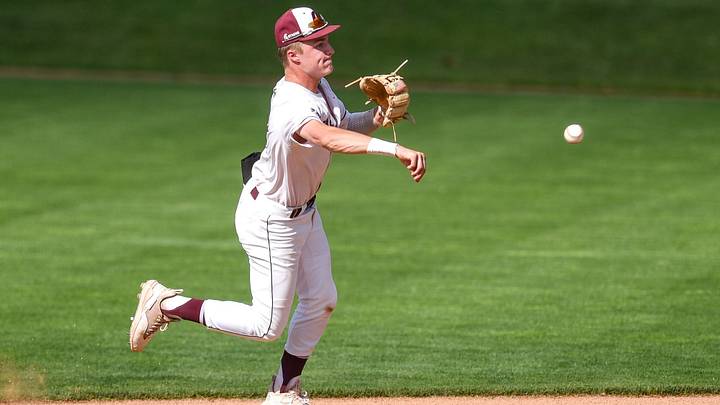 Okemos' Caleb Bonemer throws an Olivet batter out at first base during the second inning on Wednesday, May 31, 2023, at McLane Stadium on the Michigan State campus in East Lansing. Okemos' Caleb Bonemer throws an Olivet batter out at first base during the second inning on Wednesday, May 31, 2023, at McLane Stadium on the Michigan State campus in East Lansing.
