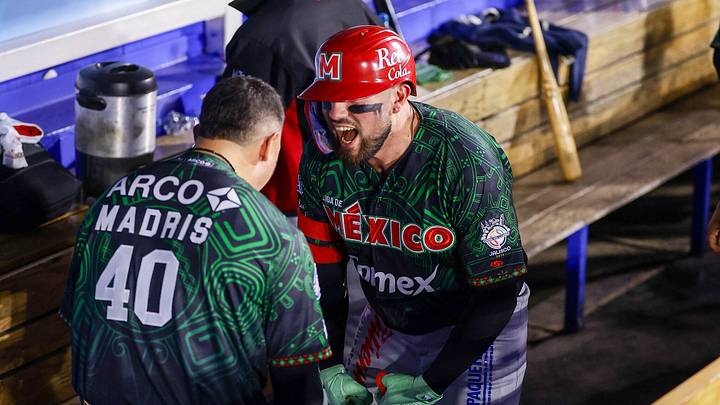 Bligh Madris y Julián Ornelas festejan el Grand Slam del primero, cuadrangular con bases llenas número 20 en la historia. Bligh Madris y Julián Ornelas festejan el Grand Slam del primero, cuadrangular con bases llenas número 20 en la historia.