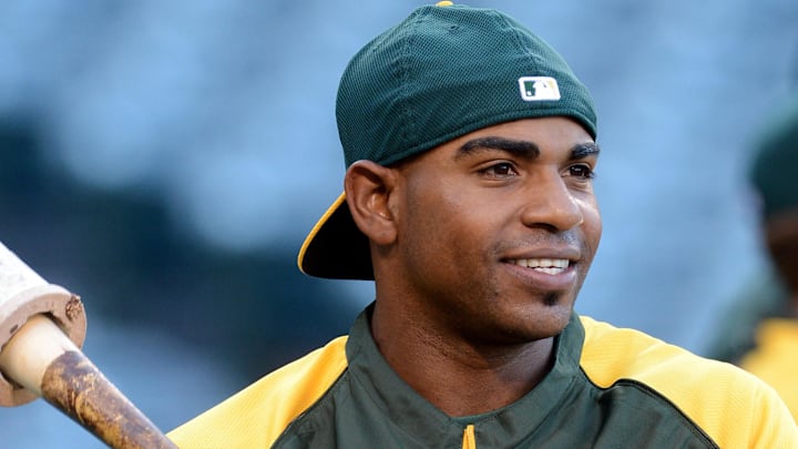 Apr 14, 2014; Anaheim, CA, USA; Oakland Athletics left fielder Yoenis Cespedes (52) gets ready for batting practice before the game against the Los Angeles Angels at Angel Stadium of Anaheim. Mandatory Credit: Jayne Kamin-Oncea-Imagn Images
