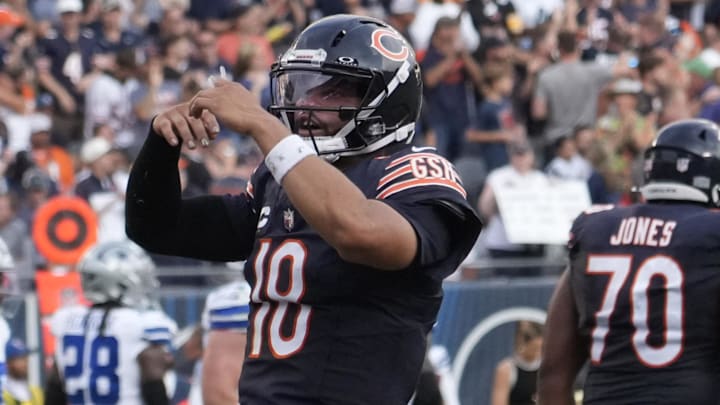Bears quarterback Caleb Williams (18) celebrates after throwing a TD against the Cowboys Bears quarterback Caleb Williams (18) celebrates after throwing a TD against the Cowboys