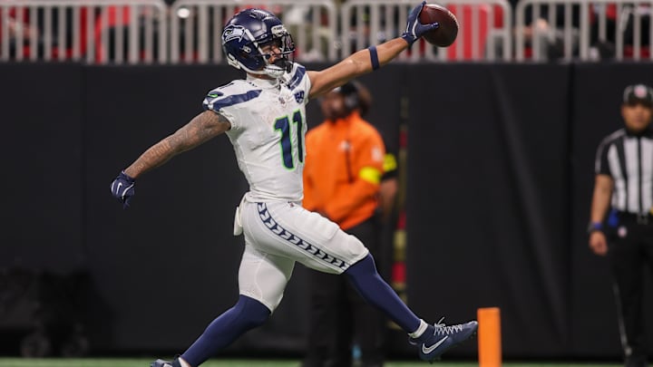 Dec 7, 2025; Atlanta, Georgia, USA; Seattle Seahawks wide receiver Jaxon Smith-Njigba (11) scores a touchdown against the Atlanta Falcons in the third quarter at Mercedes-Benz Stadium. Dec 7, 2025; Atlanta, Georgia, USA; Seattle Seahawks wide receiver Jaxon Smith-Njigba (11) scores a touchdown against the Atlanta Falcons in the third quarter at Mercedes-Benz Stadium.