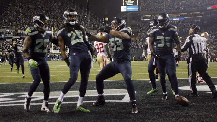 Seattle Seahawks cornerback Richard Sherman (25) celebrates after tipping a pass Seattle Seahawks cornerback Richard Sherman (25) celebrates after tipping a pass