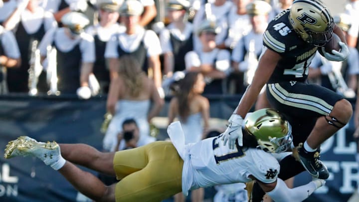 Notre Dame Fighting Irish linebacker Kyngstonn Viliamu-Asa (27) tackles Purdue Boilermakers running back Devin Mockobee (45) Saturday, Sept. 14, 2024, during the NCAA football game at Ross-Ade Stadium in West Lafayette, Ind. Notre Dame Fighting Irish won 66-7. Notre Dame Fighting Irish linebacker Kyngstonn Viliamu-Asa (27) tackles Purdue Boilermakers running back Devin Mockobee (45) Saturday, Sept. 14, 2024, during the NCAA football game at Ross-Ade Stadium in West Lafayette, Ind. Notre Dame Fighting Irish won 66-7.
