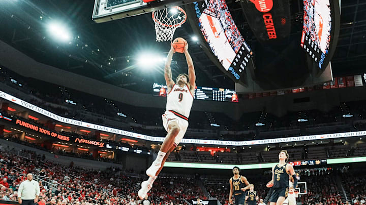 Louisville Cardinals forward Khani Rooths (9) slams down two points against Notre Dame in the first half at the KFC Yum! Center Wednesday night Feb. 4, 2026