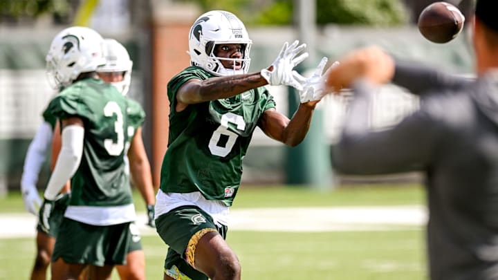 Michigan State's Nick Marsh catches a pass during the first day of football camp on Tuesday, July 30, 2024, in East Lansing.