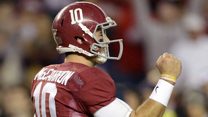 Nov 9, 2013; Tuscaloosa, AL, USA; Alabama Crimson Tide quarterback AJ McCarron (10) celebrates after a touchdown against the LSU Tigers  during the fourth quarter at Bryant-Denny Stadium. Alabama defeated LSU 38-17. Mandatory Credit: John David Mercer-Imagn Images