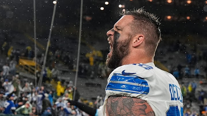 Detroit Lions left tackle Taylor Decker celebrates the 24-14 win over the Green Bay Packers as he exits the field at Lambeau Field in Green Bay, Wisconsin, Sunday, Nov. 3, 2024.
