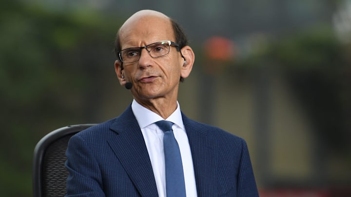 Paul Finebaum, radio and ESPN television personality, gets ready to speak on television near activities outside the Superdome, before of the College Football Playoff National Championship game in New Orleans.